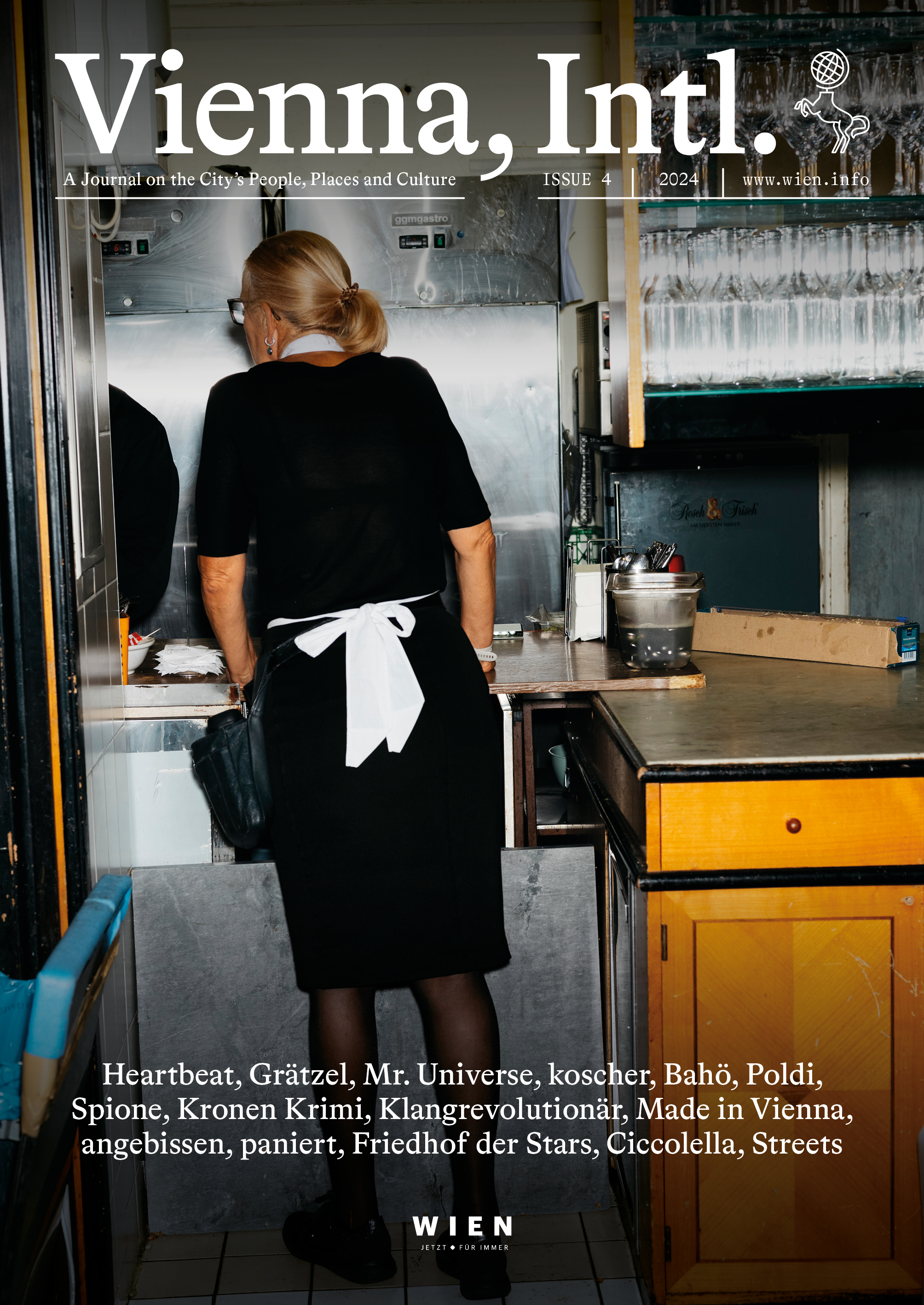 Vienna, Intl. Magazin Coverfoto (Ausgabe 2024), zeigt eine schwarz gekleidete Kellnerin mit weißer Schürze von hinten. 