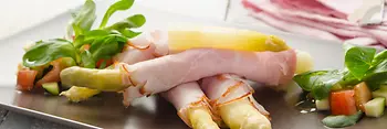 Asparagus dressed in ham