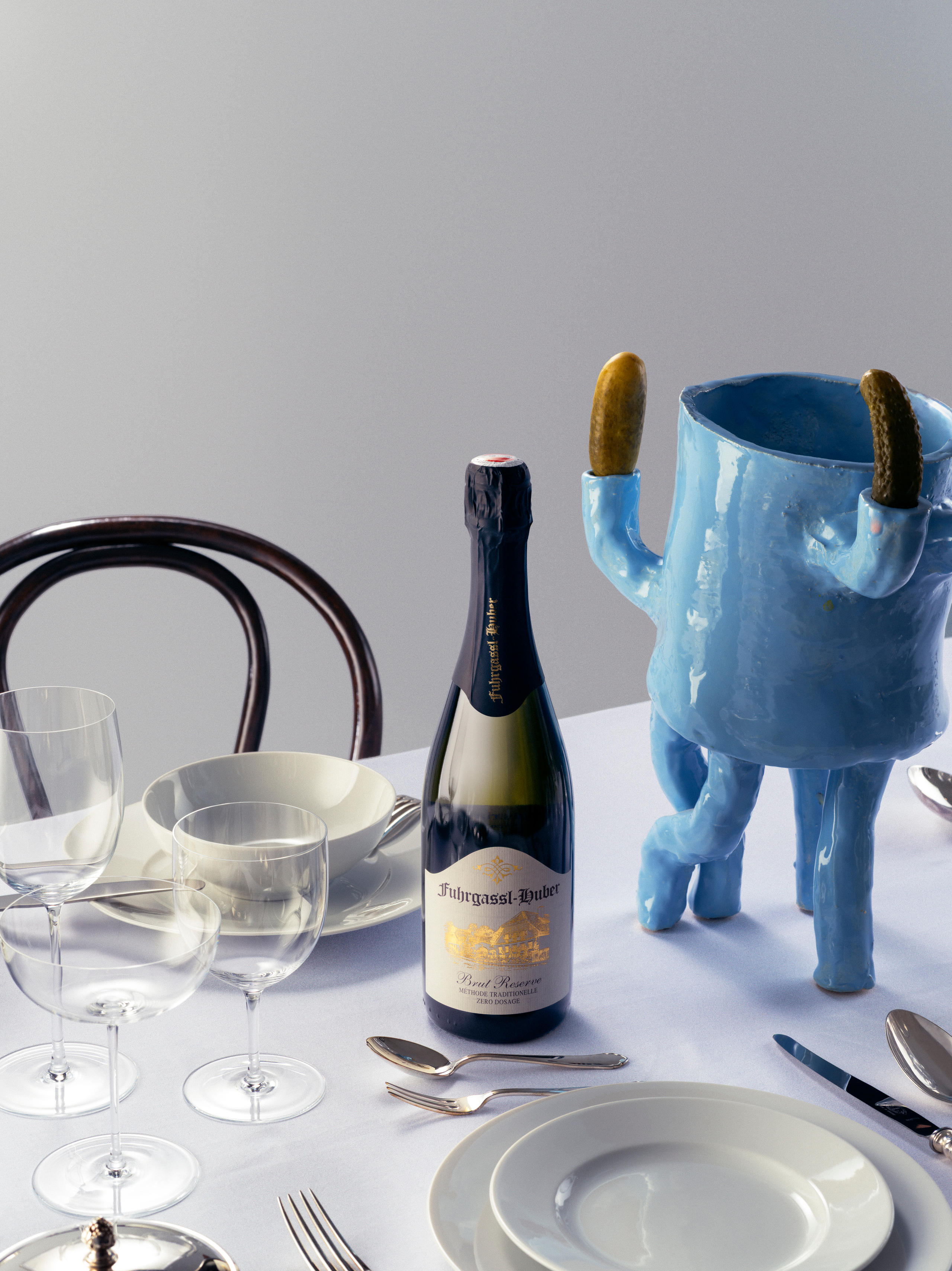 Bottle of sparkling wine with decorative items