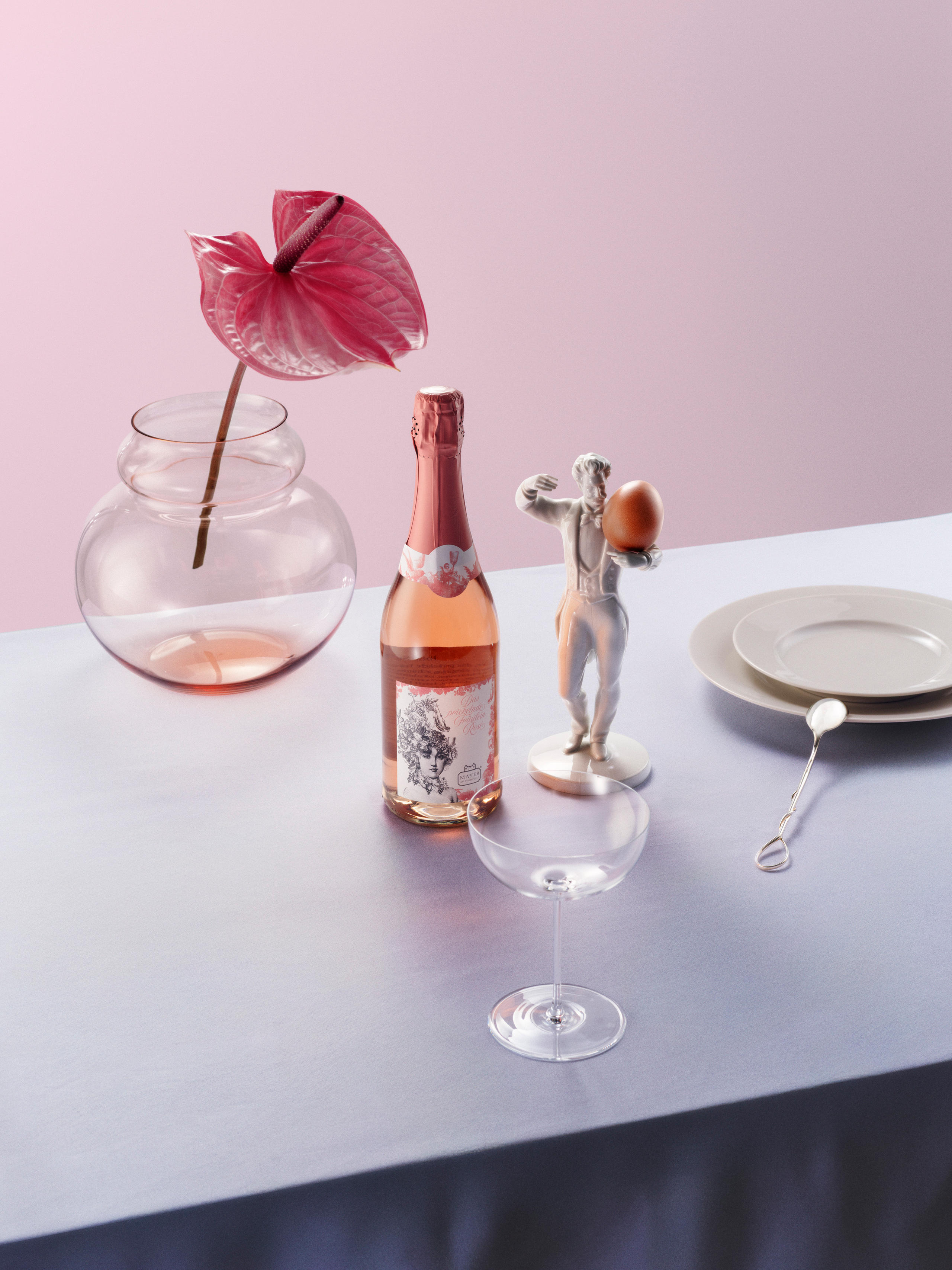 Bottle of sparkling wine with decorative items