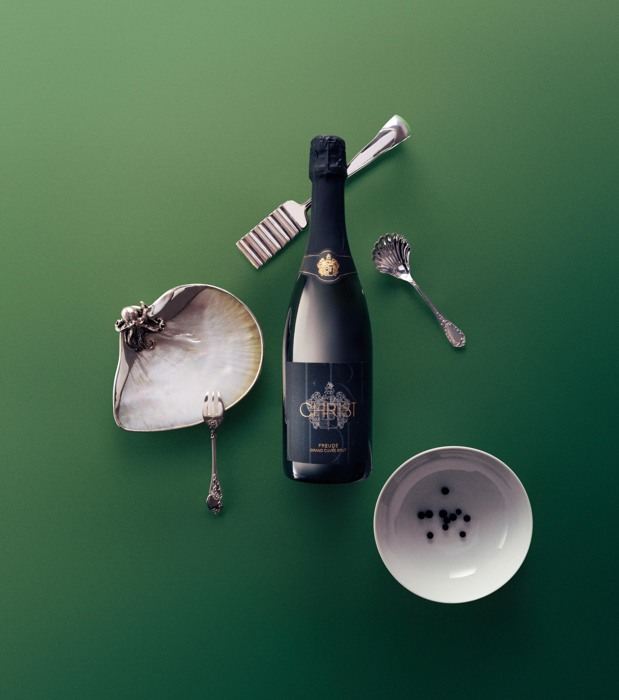 Bottle of sparkling wine with decorative items