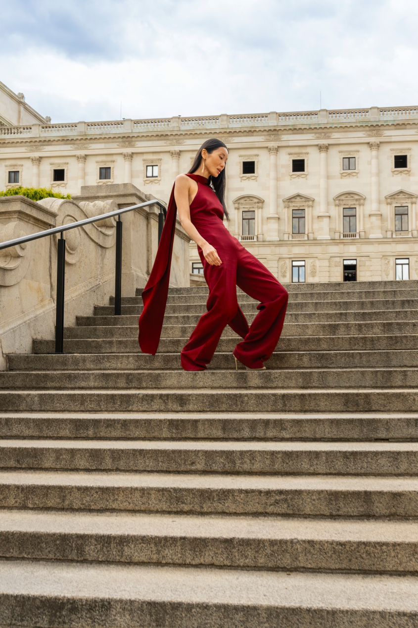 A woman walking up the steps in the Burggarten