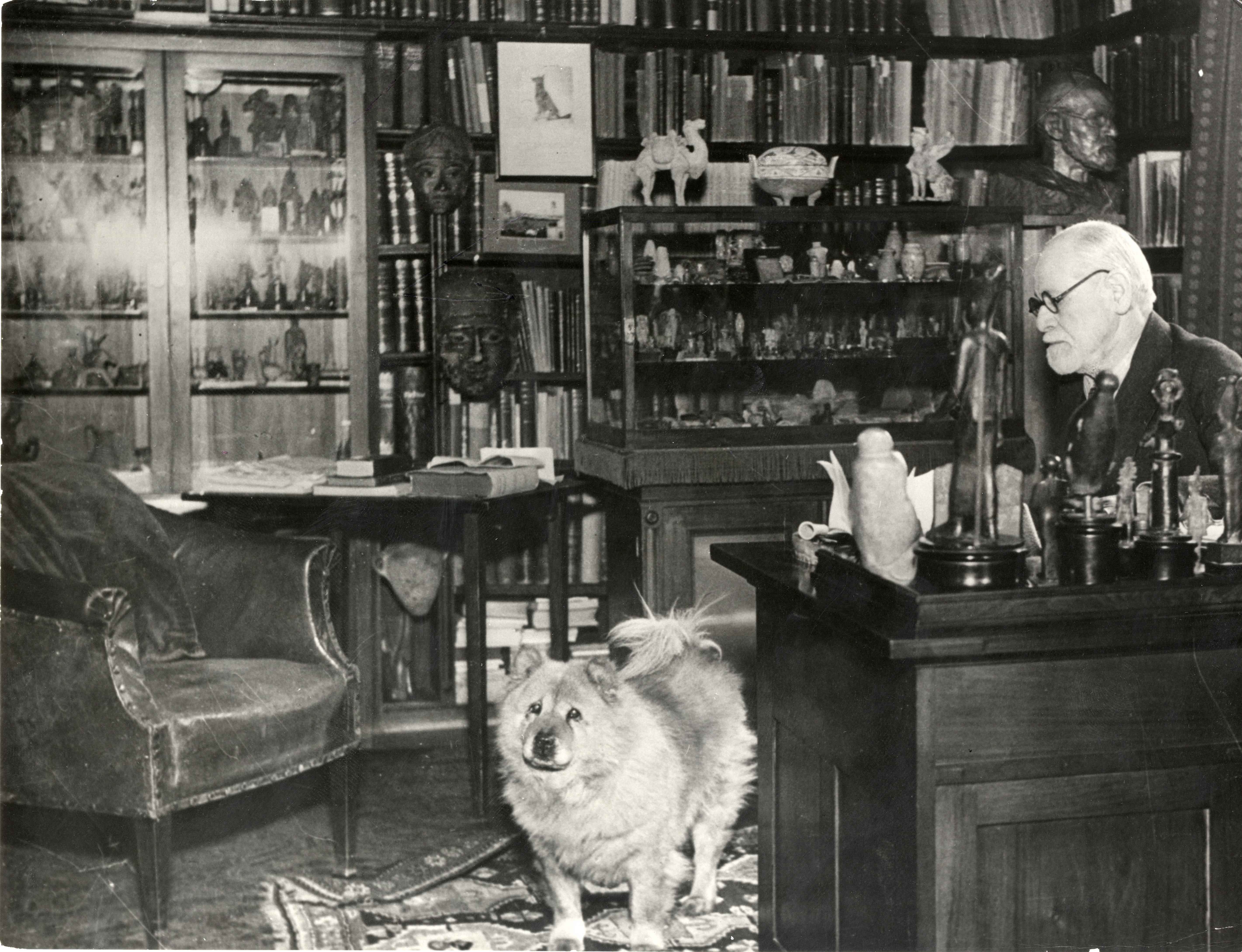 Sigmund Freud in his study with chow, 1937