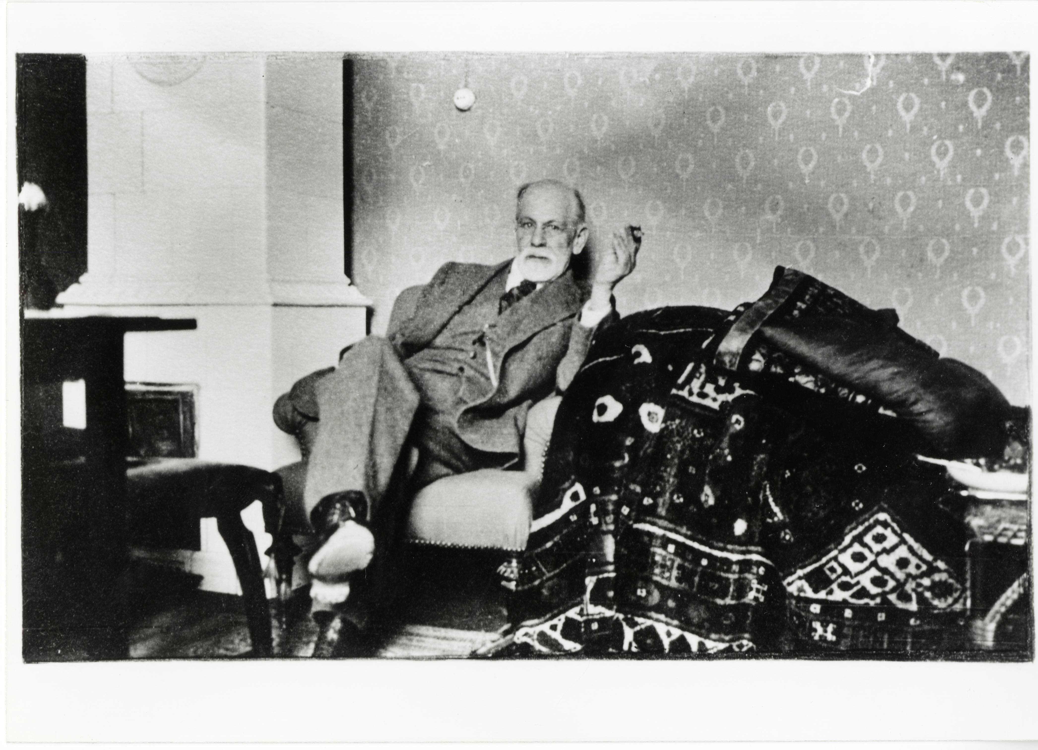 Sigmund Freud in the summer house next to a couch