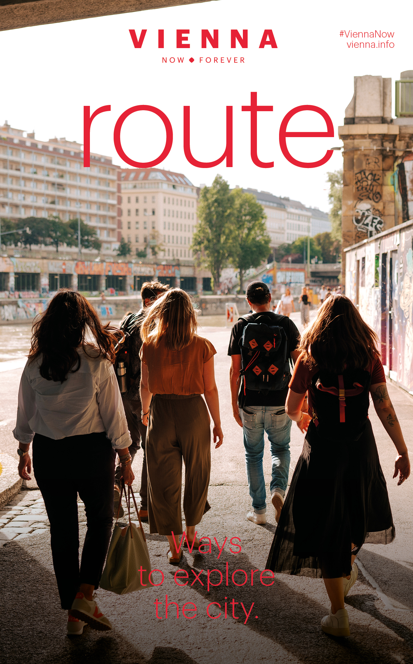Brochure route. Cover with photo of a group of young people walking along the Danube Canal. Graffiti on the walls.