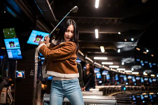 Woman playing golf