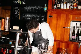 Waiter at the bar in a restaurant