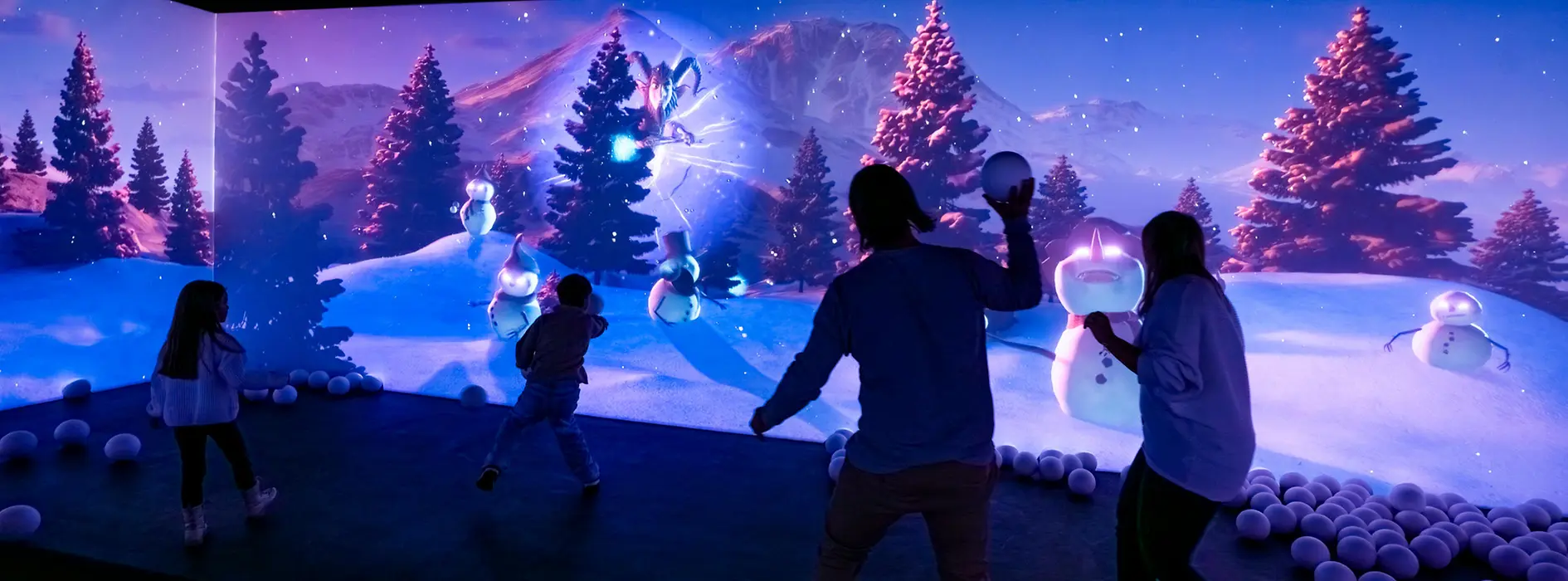 Family having a digital snowball fight