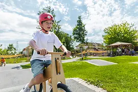 Child on a balance bike