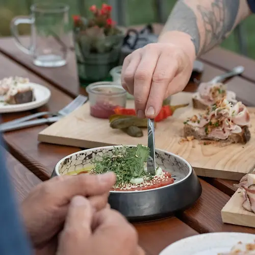 Charcuterie board with Speckbrot and beef tartare