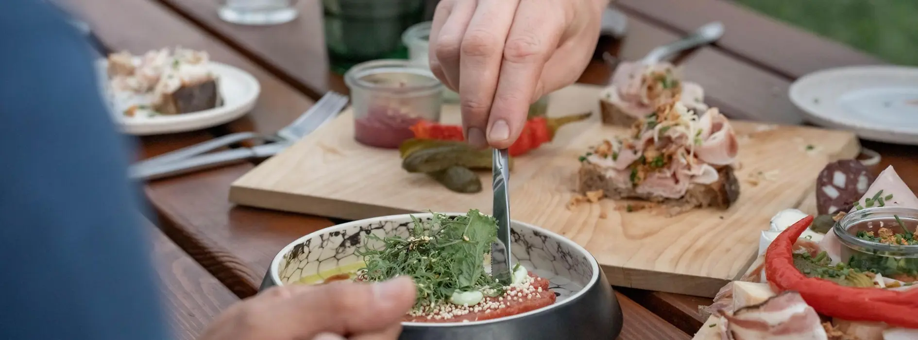 Charcuterie board with Speckbrot and beef tartare