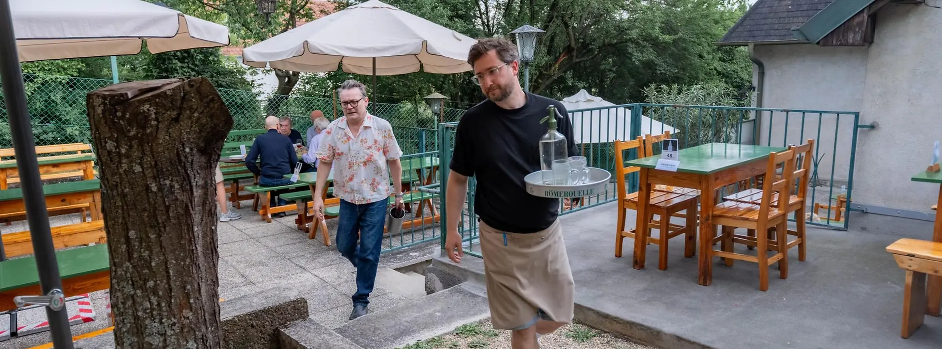 Garden of a heuriger with a waiter