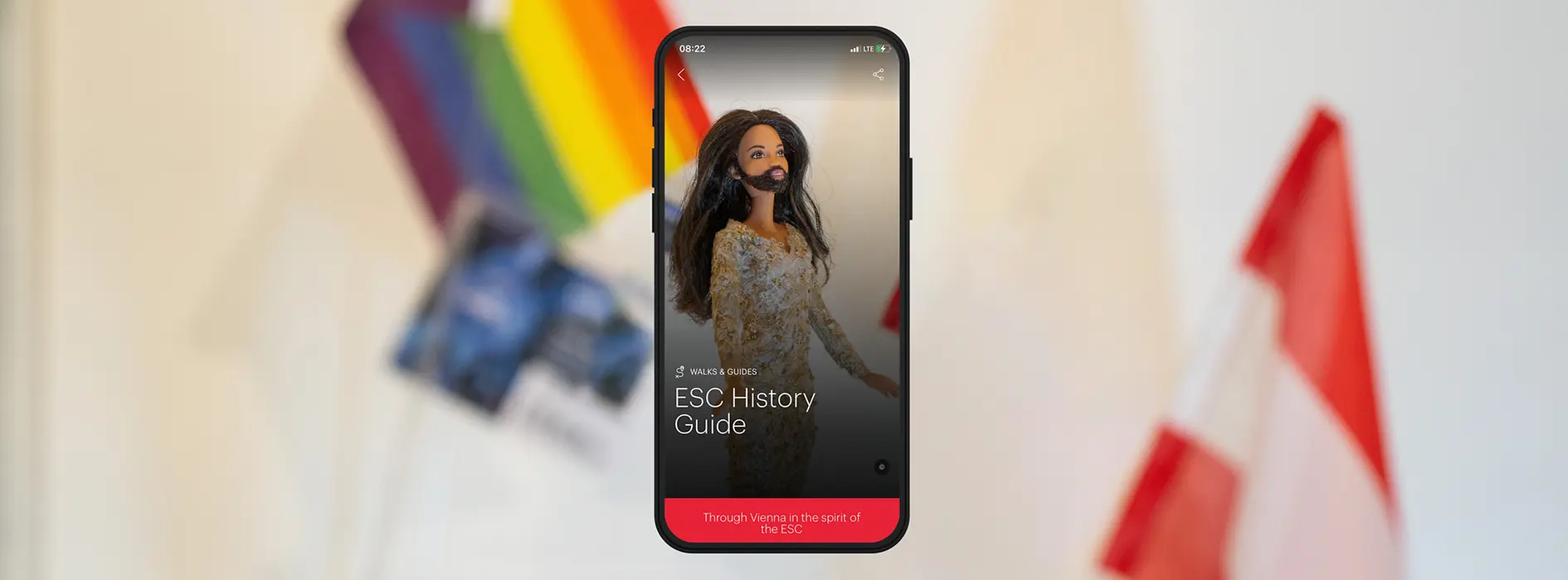 Sujet with Conchita Wurst doll with text: ESC History Guide