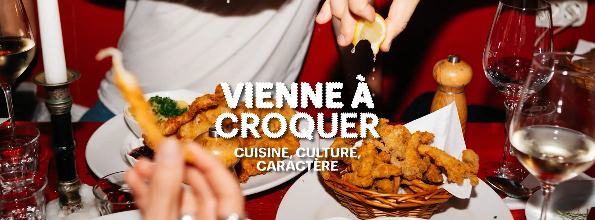 Slogan « Vienna à Croquer. Cuisine, culture, caractère » en arrière-plan Nourriture sur une table