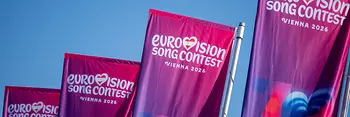 Flags featuring the Eurovision Song Contest 2026 logo in Vienna