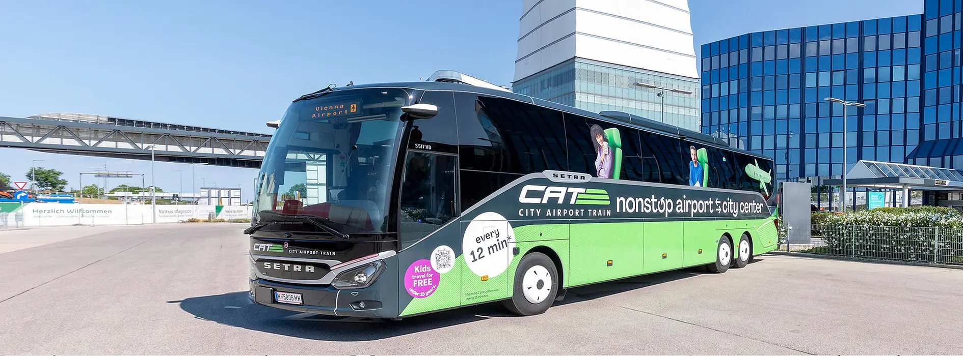 CAT by Bus in front of the tower of Vienna Airport