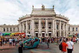 Rainbow Parade on City Hall Square with a view of the Burgtheater 