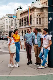 Gay and lesbian friends in front of the Vienna State Opera 