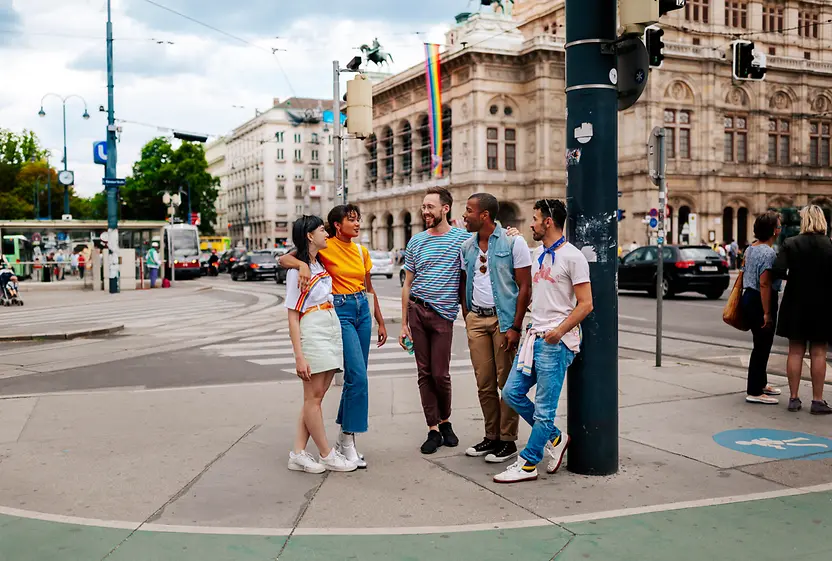 Gay and lesbian friends in front of the Vienna State Opera 