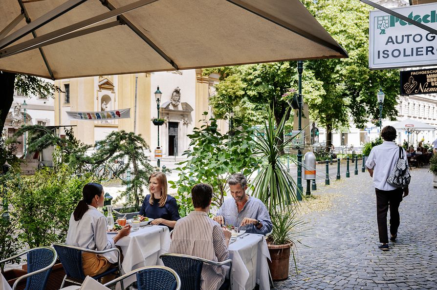 People sitting in an outdoor dining area