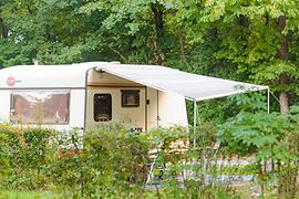 Motorhome with canopy in the countryside, Wien West