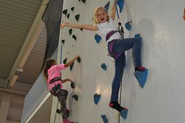 Family Fun, two girls at a climbing wall