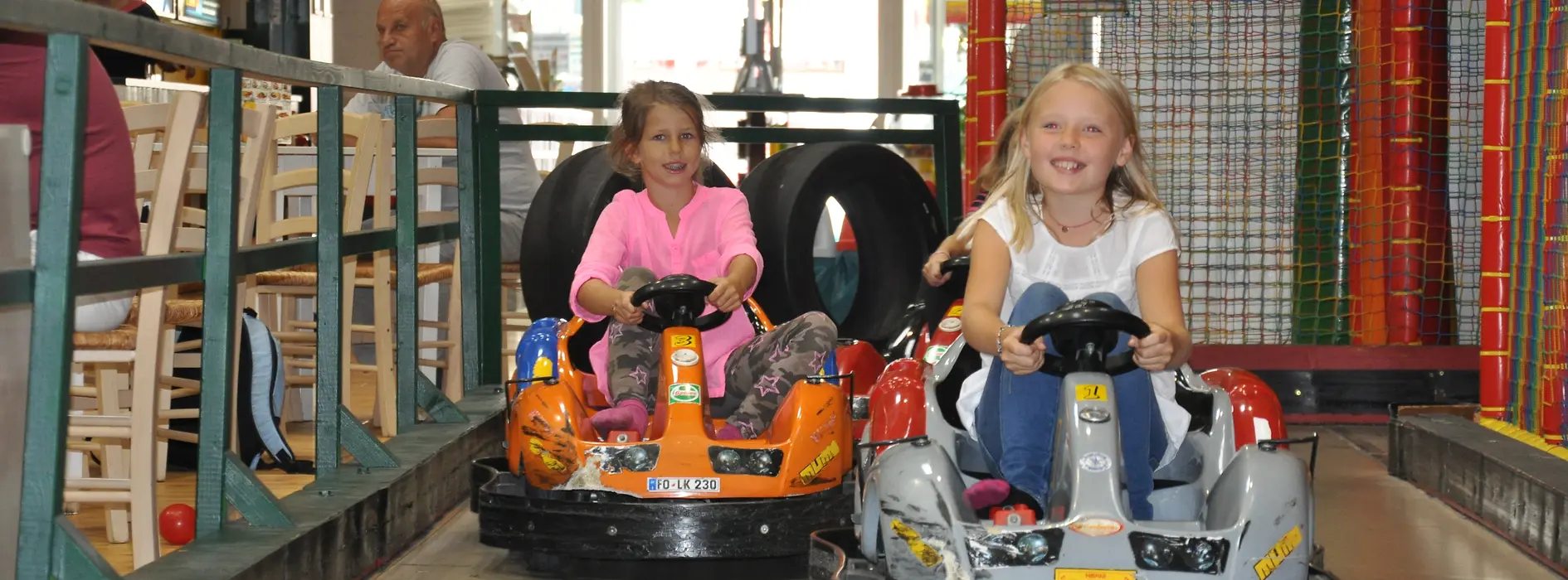 Family Fun, two girls in scooters