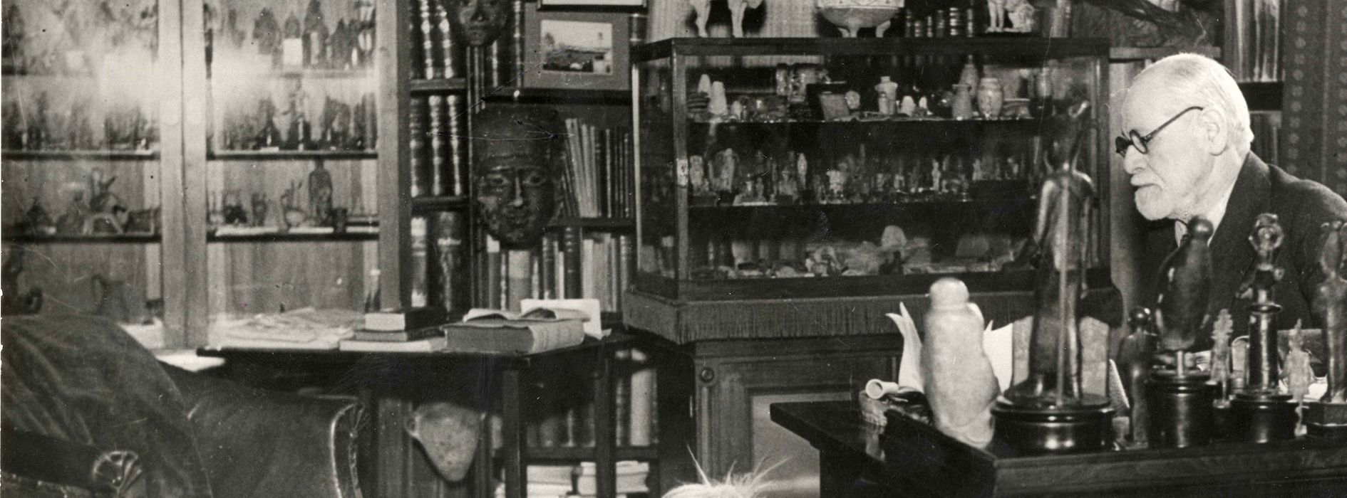 Sigmund Freud in his study with chow, 1937