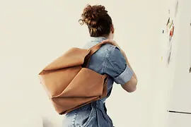 Woman with a leather bag