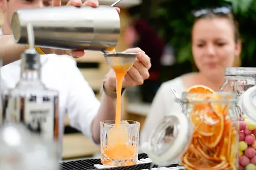 People at an al fresco cocktail festival