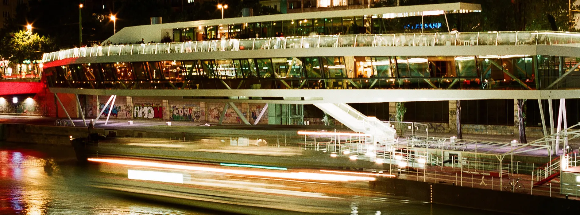 Exterior view of Motto by the river at night