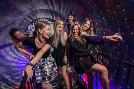 Women in the vortex tunnel at the Museum of Illusions