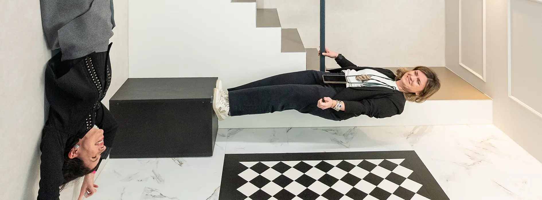 Persons in fron on a wall