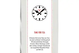 Paquete de té con diseño de reloj