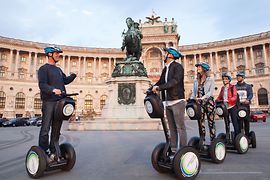 Group on Segways in front of the Imperial Palace