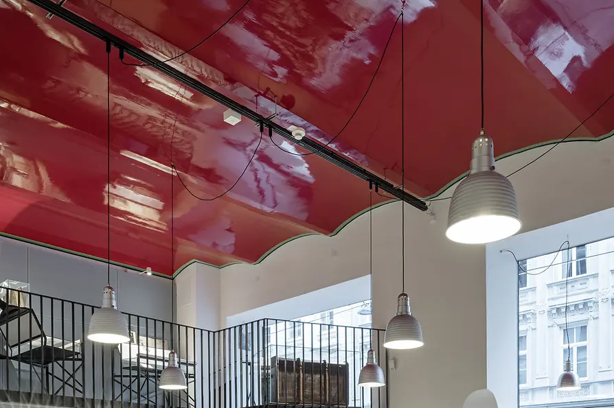 Foyer and Café in the new Sigmund Freud Museum with undulating red ceiling 