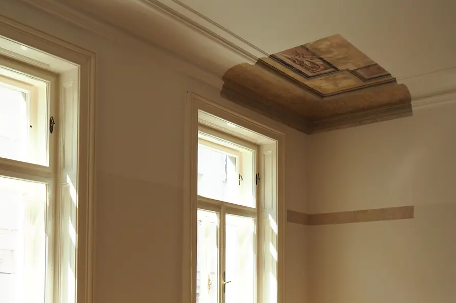Detailed view of Anna Freud's room with exposed ceiling fresco