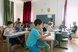 Piccoli Cantori in classe durante la lezione