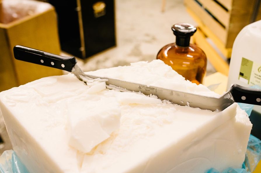 Huge block of soap with a knife 