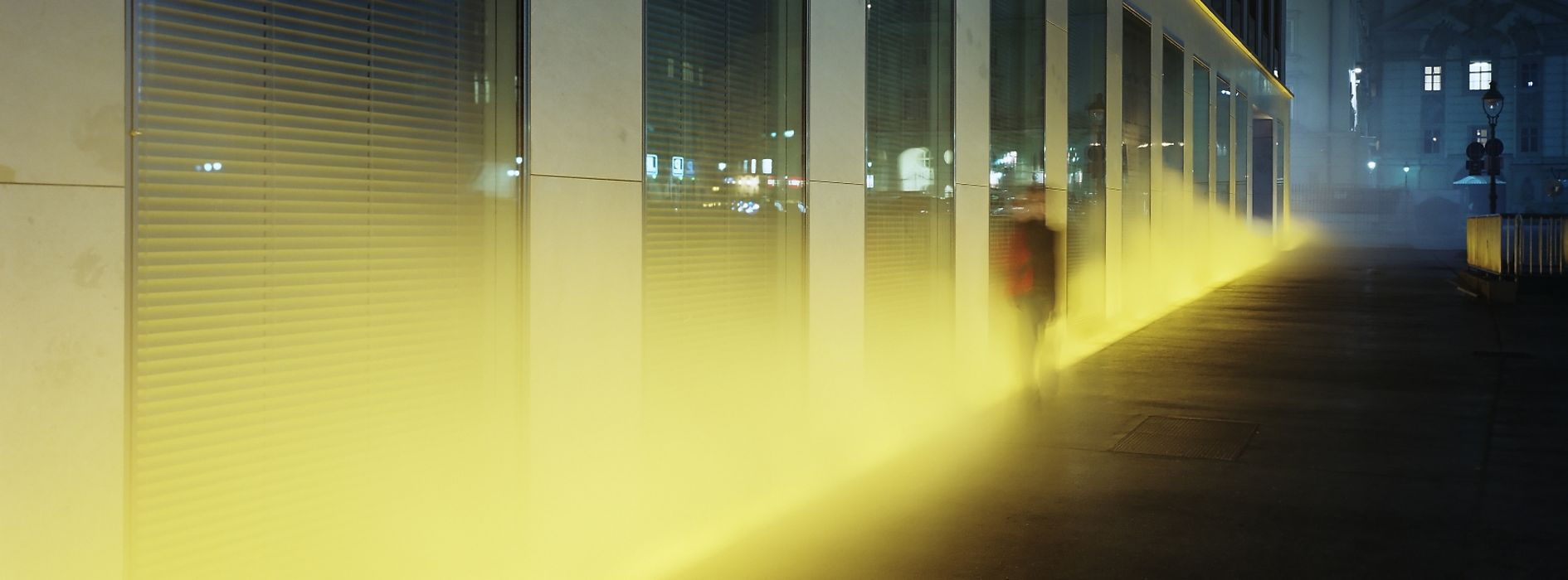 The Yellow Fog light spectacle at the headquarters of Verbund in Am Hof.