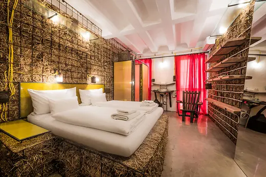 Hotel room with straw beds