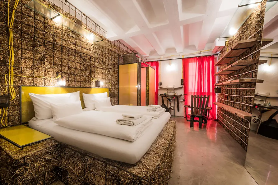 Hotel room with straw beds