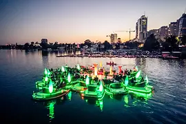 Floating islands on the old Danube at the first Floating Concert with Vienna skyline in the background