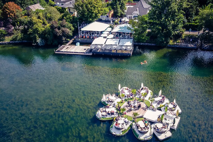 Floating islands on the old Danube at the Floating Concert with restaurant in the background