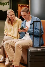 Two persons with luggage