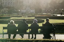 People sitting on park bench