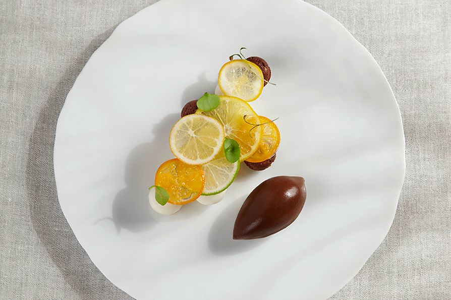 Restaurant Steirereck, dessert: citrus fruits from Schönbrunn with cacao and young coconut.