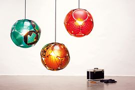 Gabarage upcycling design, three colorful lampshades made of plastic