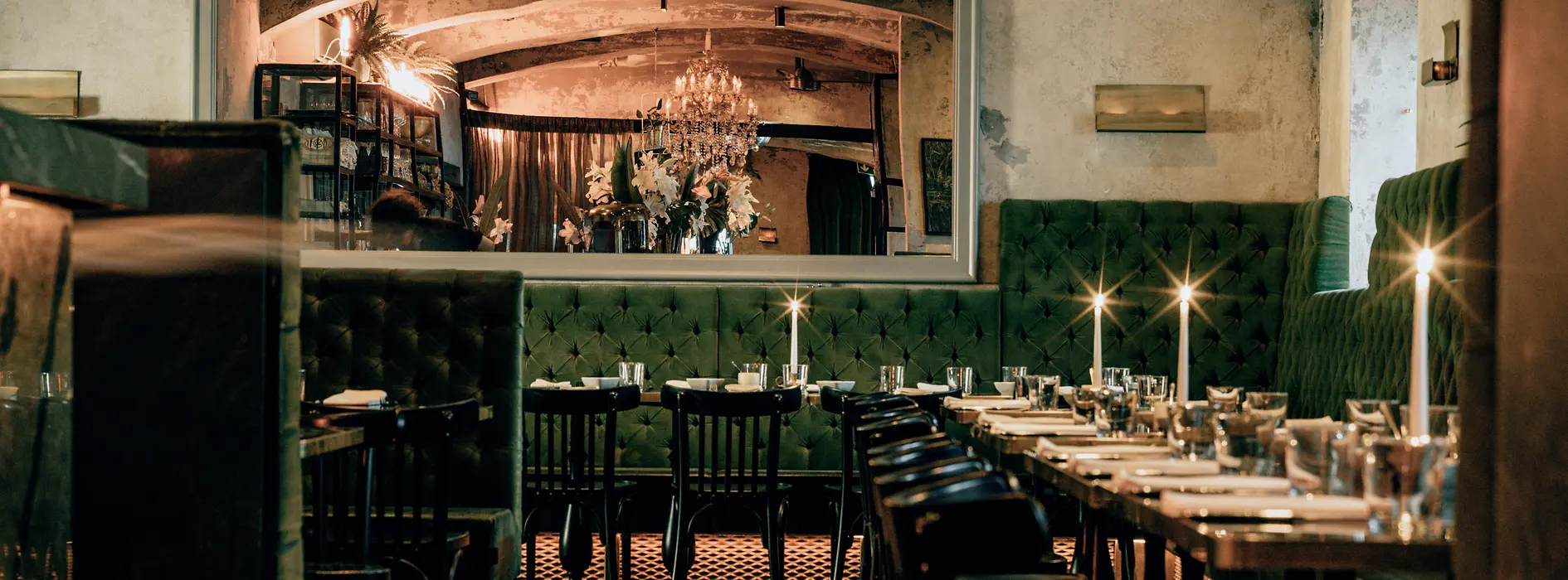 Motto restaurant with glitterballs and tables with candles