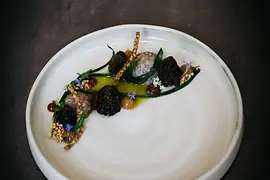 Plate with a finely garnished buckwheat dish